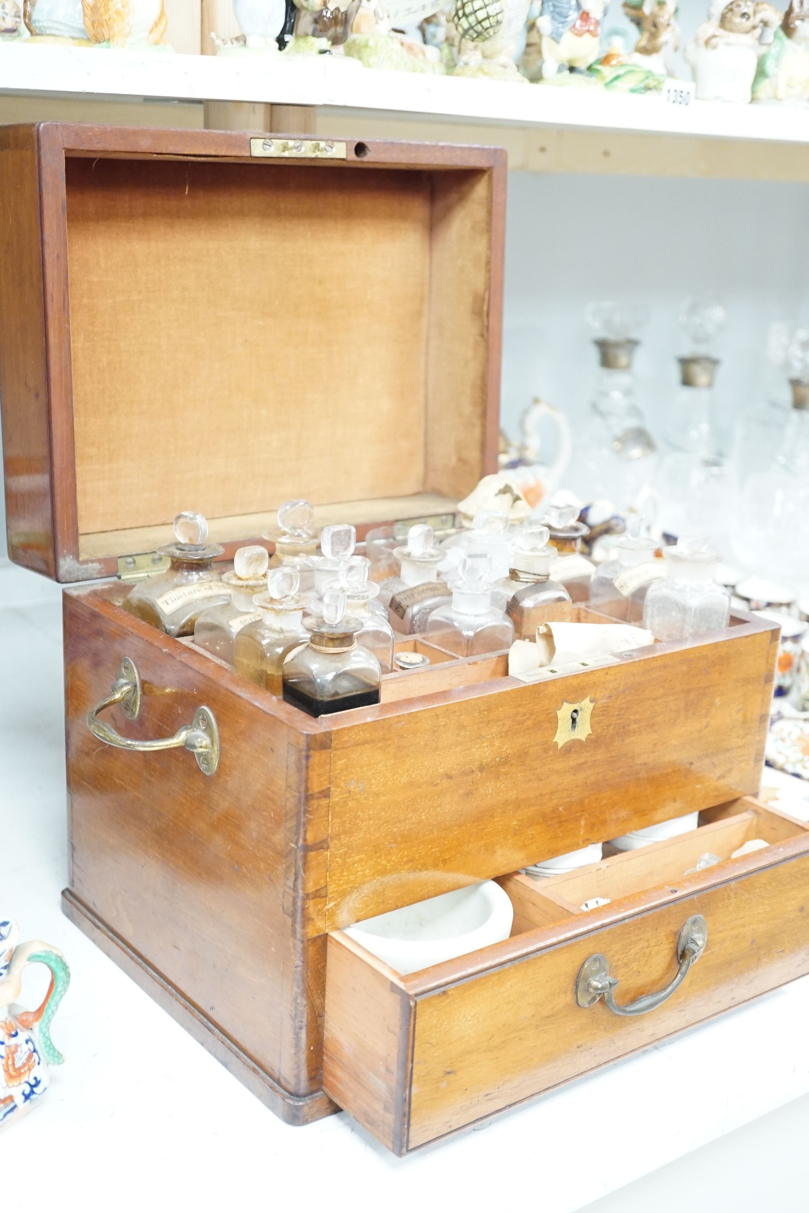 A Victorian mahogany apothecary box and contents, 32 cm wide